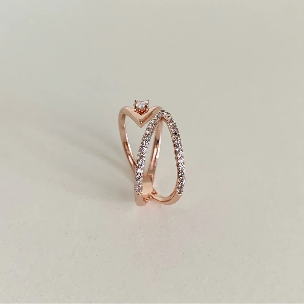NWOT Rose gold X ring